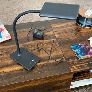 Desk lamp with USB port for charging phones/tablets